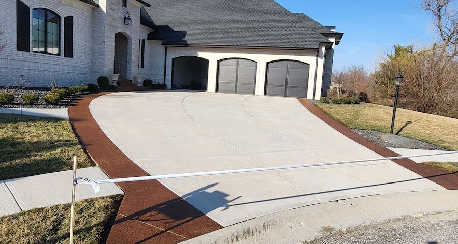 a large house with a driveway leading to it