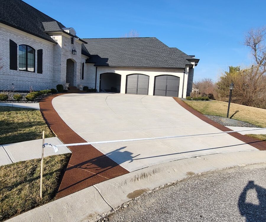 a large house with a driveway leading to it