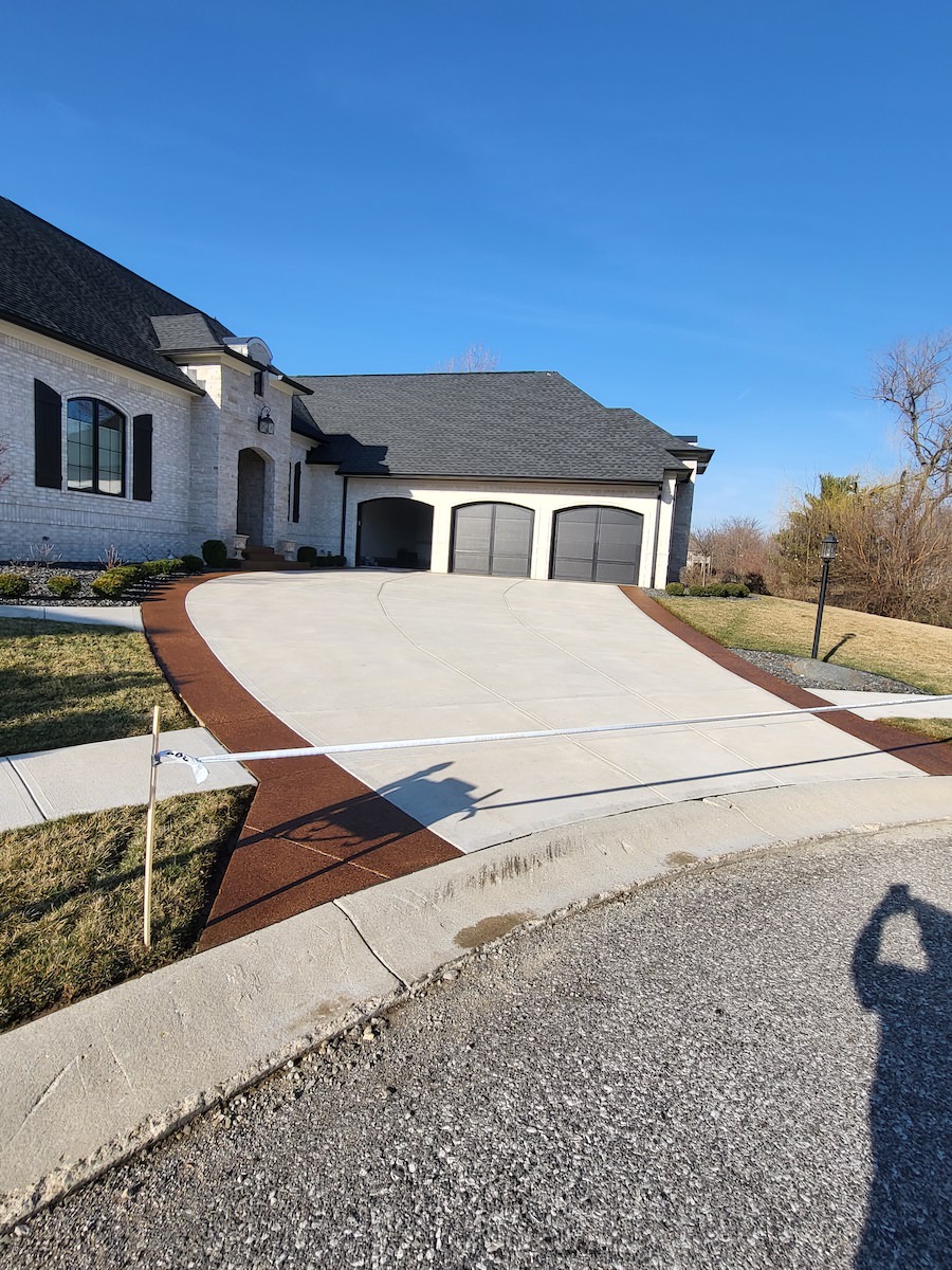 a large house with a driveway leading to it