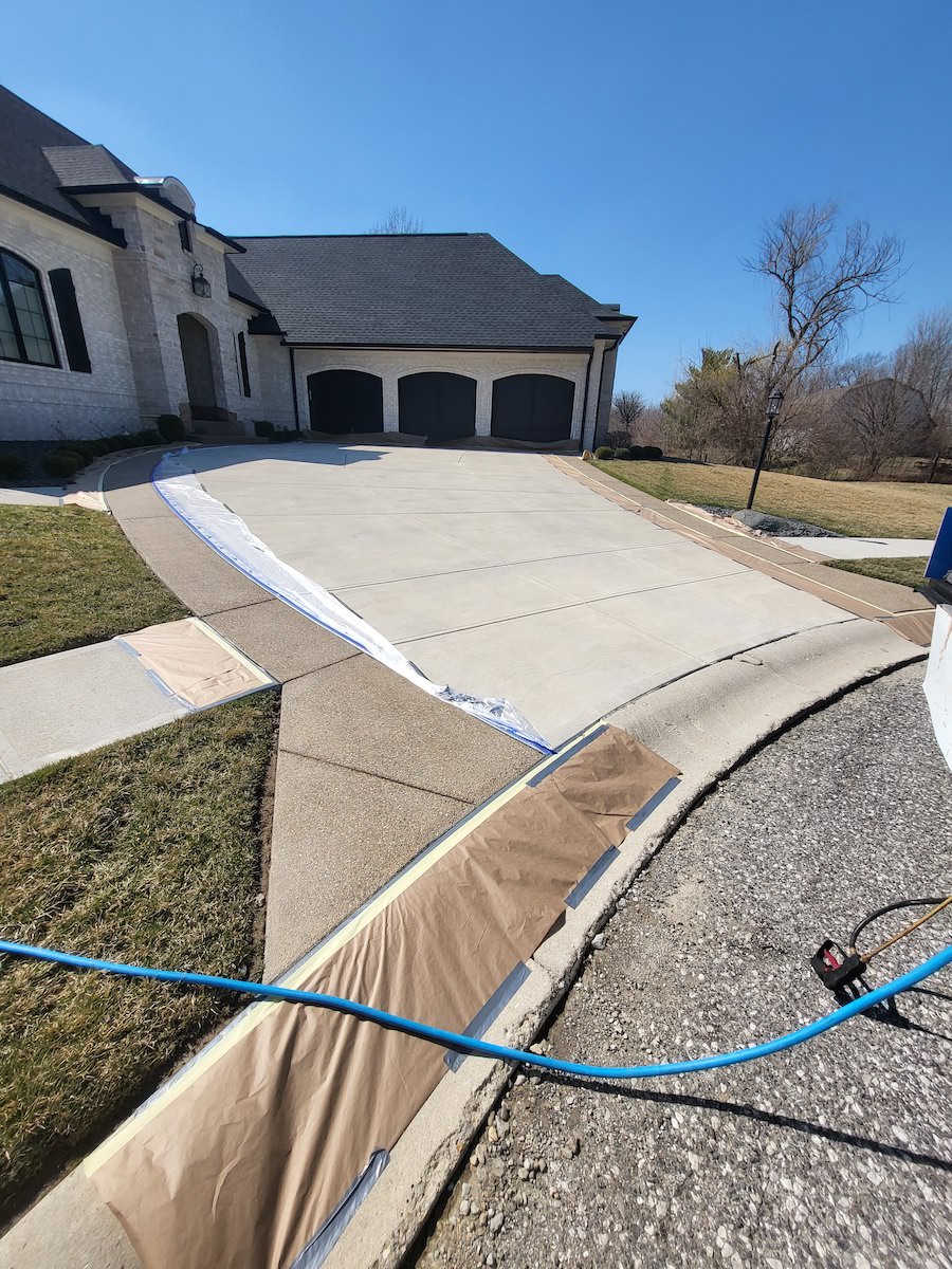 a large house with a driveway leading to it