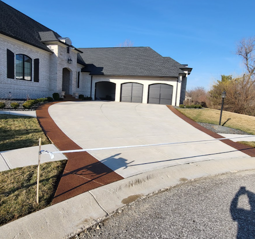 a large house with a driveway leading to it