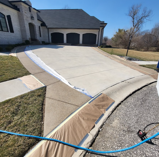 a large house with a driveway leading to it